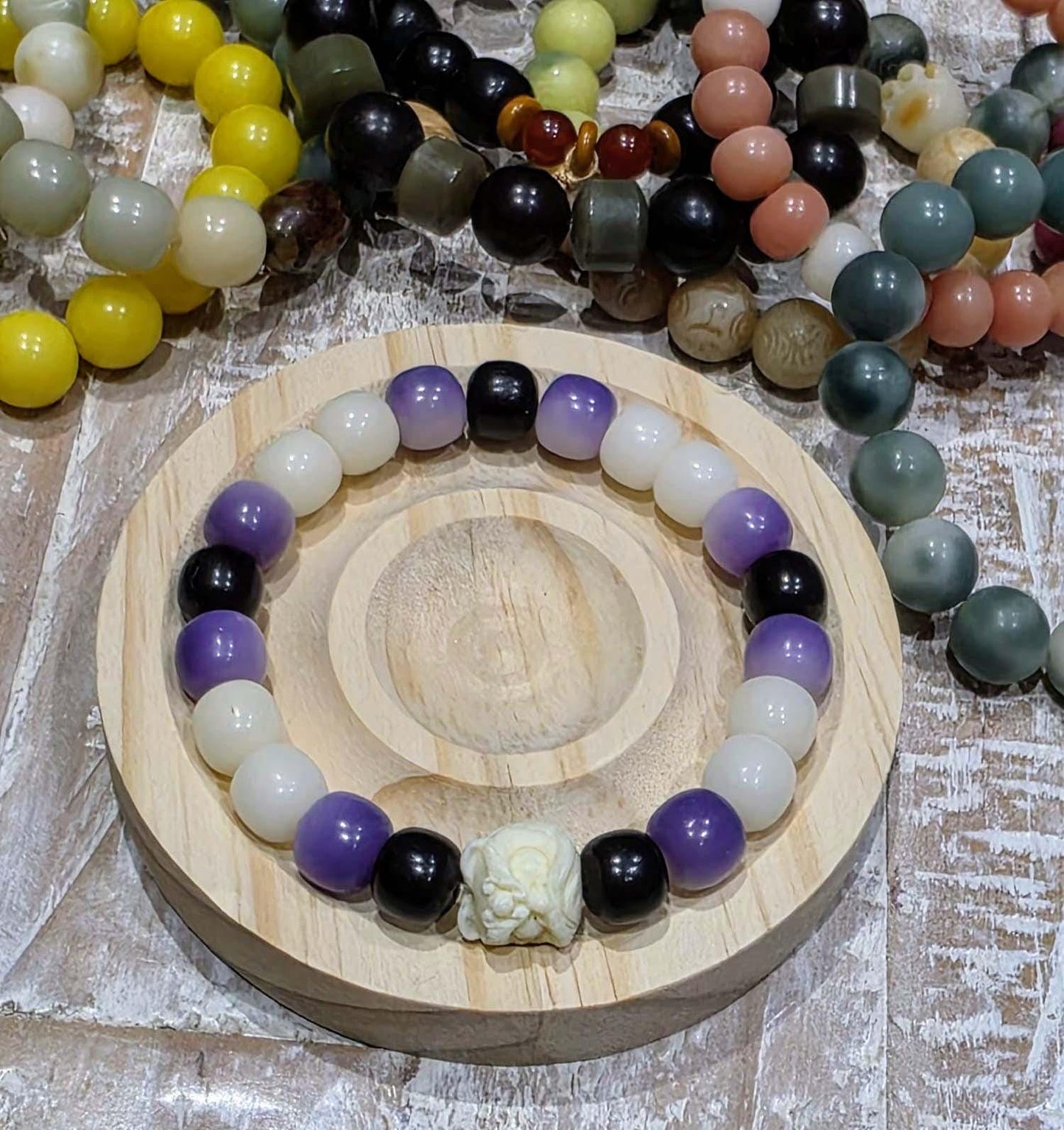 Handmade Bodhi Bead Bracelet — White, Black & Purple Barrel with White Lion Spacer